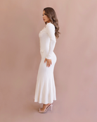 The curve-hugging Arabella ribbed knit maxi in white.