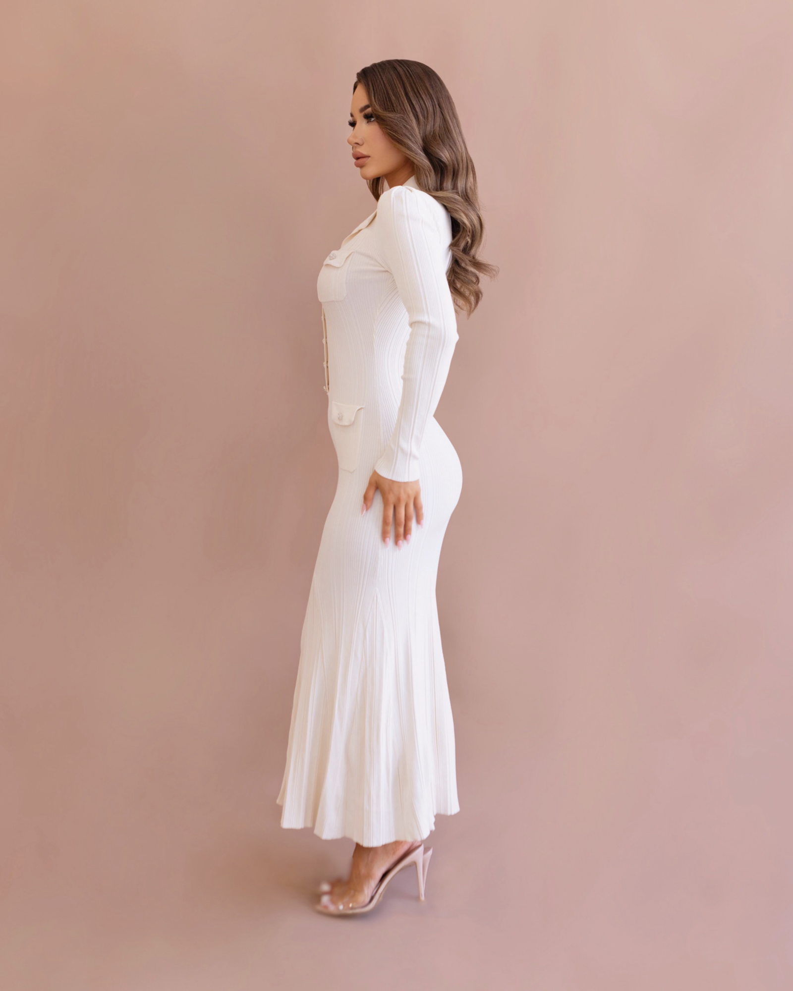 The curve-hugging Arabella ribbed knit maxi in white.