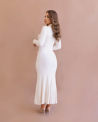 The curve-hugging Arabella ribbed knit maxi in white.